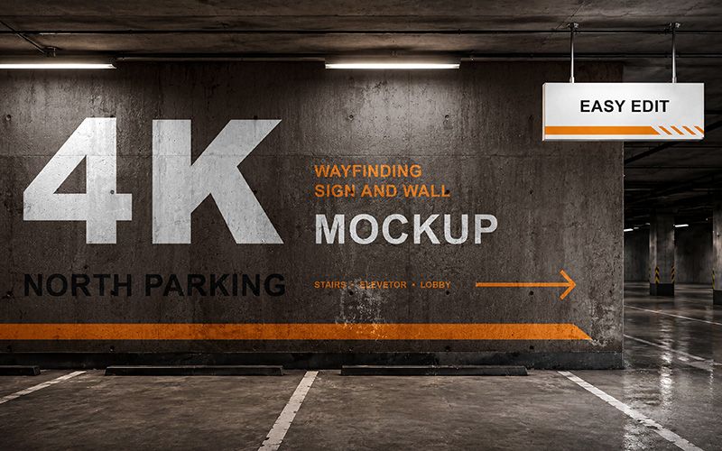 Free Wayfinding Sign and Wall Mockup PSD in an underground parking garage with concrete wall, hanging sign, arrows, and orange navigation line.