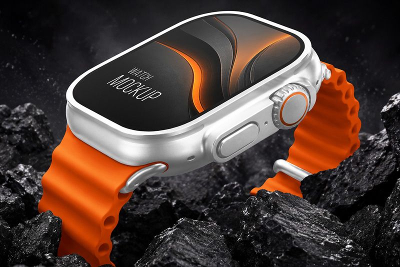 Macro side view smartwatch mockup showing rugged case, crown, side buttons, orange strap, and editable watch face area.
