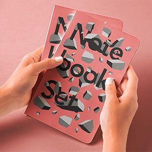 small_hands-holding-psd-notebook-mockup