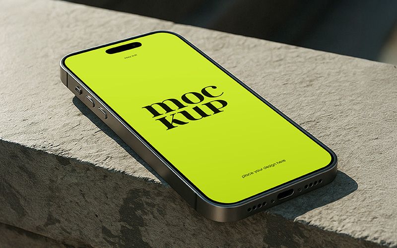 Free iPhone Pro Max on Rock Mockup