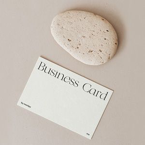 small_free-business-card-with-beige-stone-mockup