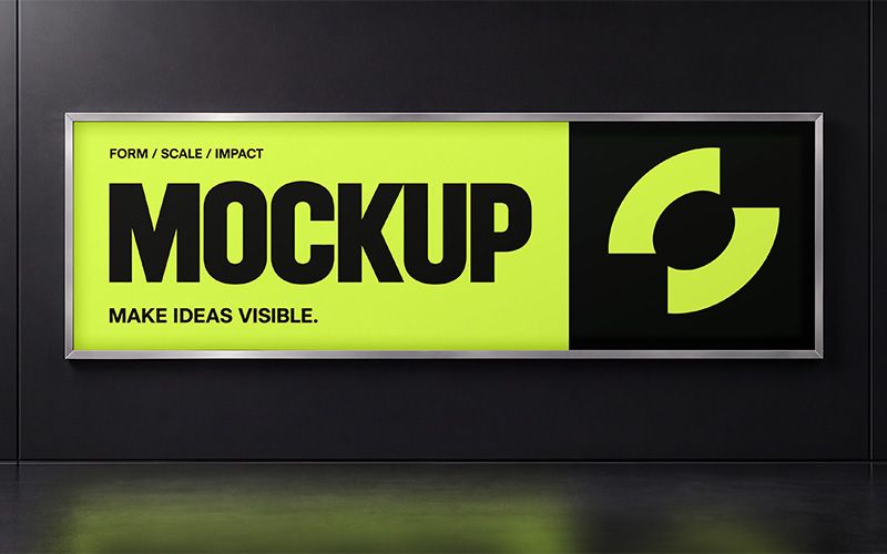 Horizontal lightbox mockup on a black wall with lime green and black MOCKUP artwork in a silver frame