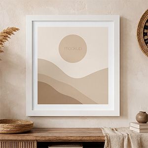 Neutral boho poster frame mockup with beige wall, pampas grass, woven wall basket, and soft natural styling.