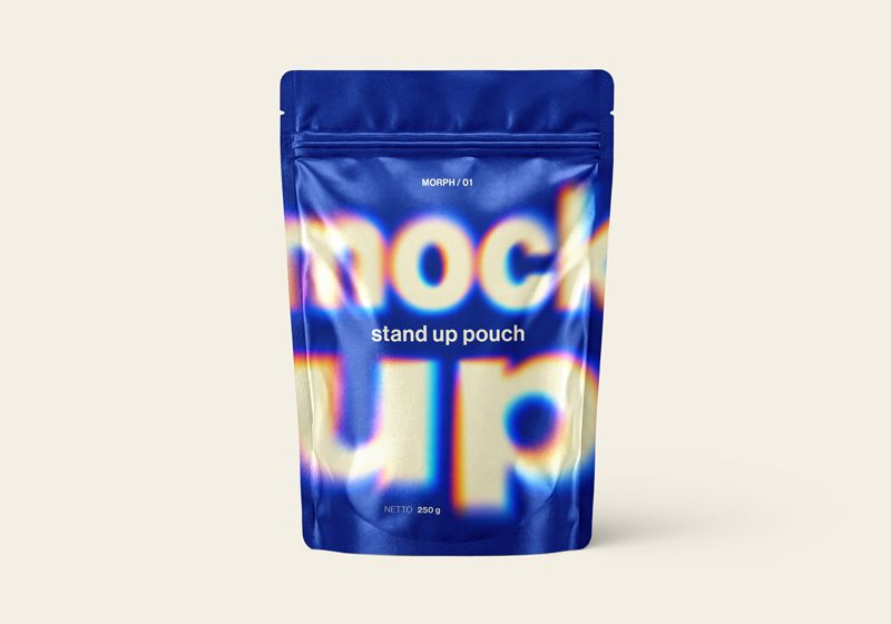 Blue stand up pouch mockup with oversized blurred lettering on a cream background