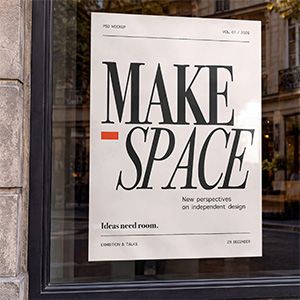 Shop window poster mockup with MAKE SPACE typography and street reflections